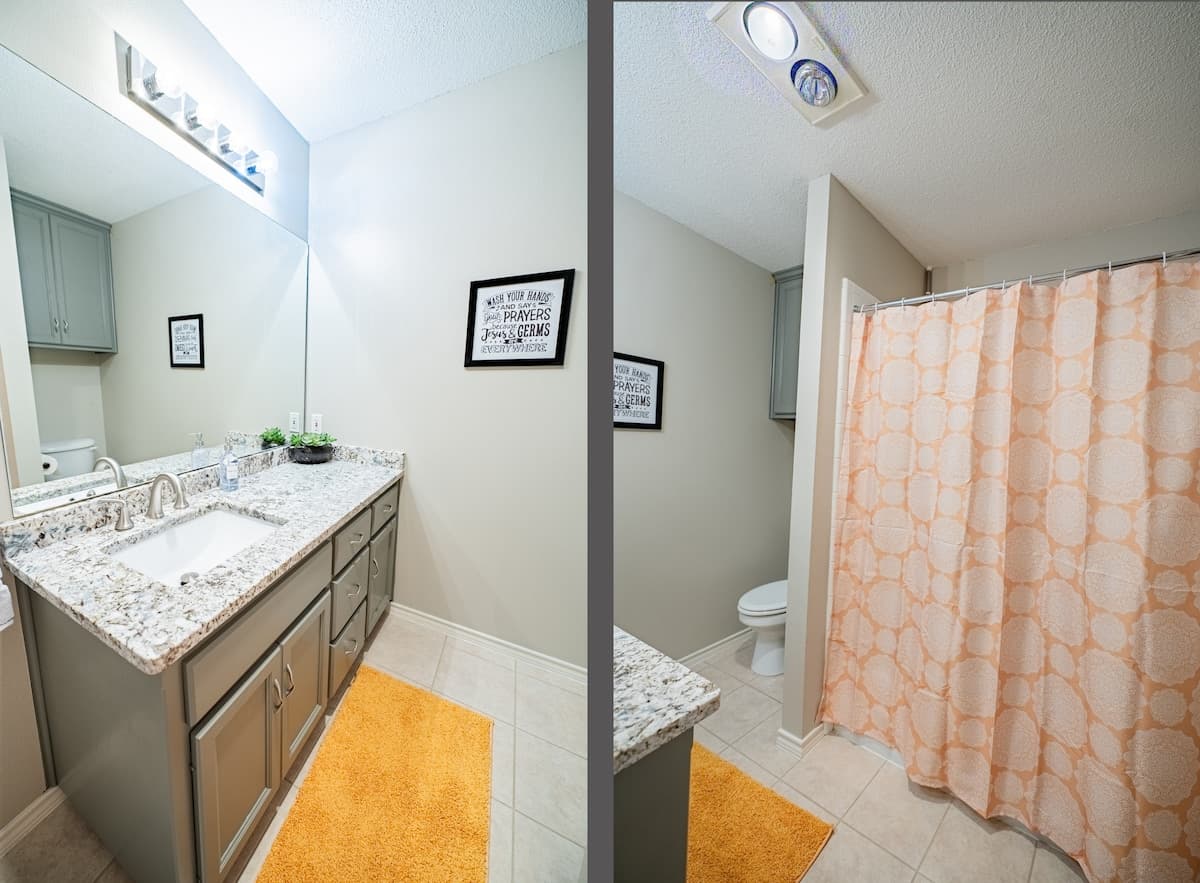 Secondary bathroom with shower/tub combo.
